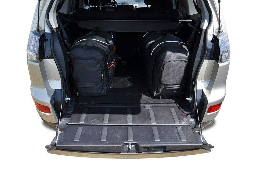 Kjust Mitsubishi Outlander II 2007-2013 Reistassenset